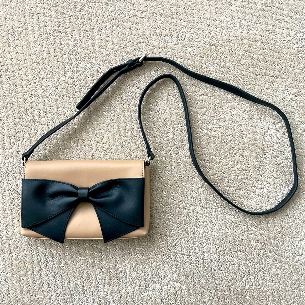 Kate Spade tan crossbody with black bow